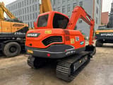 2022 Doosan DX75 crawler excavator rear three-quarter view