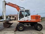 1995 Atlas 1404 wheel excavator side view