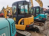 2018 Komatsu PC40 MR mini excavator, front three-quarter view