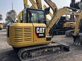 2021 Caterpillar 306E2 mini excavator, rear three-quarter view