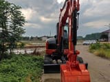 Kubota KX163-5 mini excavator, front view