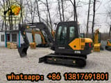 2022 Volvo EC55DL mini excavator, side view