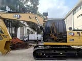 2022 Caterpillar 320GX crawler excavator, side view