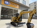 2024 Caterpillar 305.5E2 mini excavator, side view
