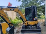 2022 Caterpillar 303.5ECR mini excavator, front three-quarter view