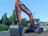 2025 Develon DX360LCA-7B crawler excavator, front three-quarter view