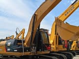 2024 Caterpillar 320D rupsgraafmachine, zijaanzicht