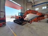 2015 Develon DX85R-7 mini excavator, side view