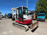 2017 Takeuchi TB260 mini excavator, front three-quarter view