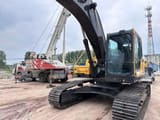Volvo EC240 crawler excavator, front three-quarter view