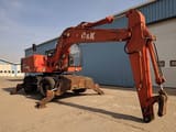 1999 O&K MH 5 wheel excavator, side view