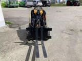 2024 Giant GS900 mini excavator, front view with pallet forks