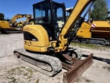 2007 Caterpillar 304CCR mini excavator, front three-quarter view