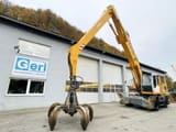 2011 Liebherr A934C material handler with grapple attachment