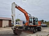 1995 Atlas 1404 wheel excavator, side view