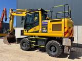 2022 Komatsu PW180 wheel excavator, rear three-quarter view