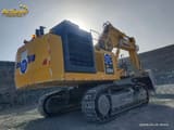 2022 Komatsu PC1250-11R crawler excavator, rear three-quarter view