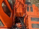 2022 Doosan DH150W-7 wheel excavator top-down view of cab and boom base