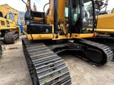 2024 Caterpillar 329D crawler excavator, front three-quarter view