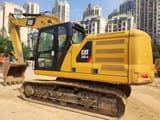 2023 Caterpillar 320GC crawler excavator side view