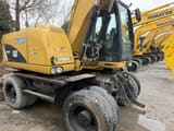 2018 Caterpillar M315D2 wheel excavator, side view
