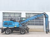 2016 Fuchs MHL320D material handler, side view