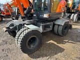 2014 Doosan DX55W wheel excavator side view