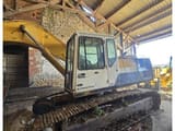 1992 Komatsu PC210LC crawler excavator, side view