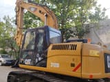Caterpillar 312D crawler excavator, side view
