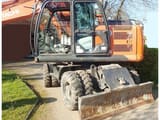2014 Hitachi ZX140W-5 wheel excavator side view