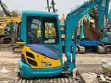 2022 Kubota U-25 mini excavator, side view