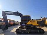 2023 Volvo EC240 crawler excavator, side profile view
