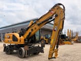 2024 Caterpillar MH3022-07A material handler, side view