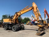 2014 Hyundai R180W-9A wheel excavator, side profile view