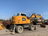2015 Liebherr A912 Compact wheel excavator, rear three-quarter view