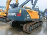 2026 Hyundai Robex 215L crawler excavator, rear three-quarter view