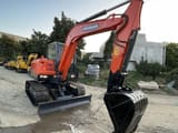 2022 Doosan DX60 mini excavator, front three-quarter view
