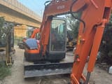 2019 Hitachi ZX55 mini excavator, front three-quarter view