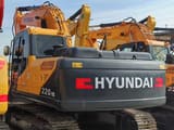 Hyundai R220LC-9S crawler excavator, rear three-quarter view