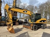2008 Caterpillar M318D wheel excavator, side view
