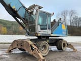 2015 Fuchs MHL350 material handler, side view