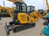2018 Komatsu PC55MR-2 mini excavator, rear three-quarter view