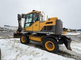 2014 Volvo EW140D wheel excavator, rear three-quarter view
