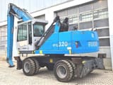 Manipulador de materiais Fuchs MHL320D de 2016, vista traseira a três quartos