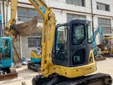 2023 Komatsu PC40MR mini excavator, three-quarter front view
