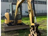 2011 Caterpillar 304DCR crawler excavator, front three-quarter view