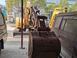 2011 Caterpillar 308C mini excavator, front view of bucket and boom