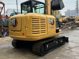 2021 Caterpillar 305.5E2 mini excavator rear three-quarter view