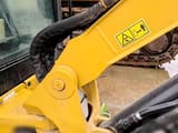 2025 Caterpillar 303CR mini excavator boom and cab detail