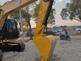 Caterpillar 312D2GC crawler excavator boom and bucket view
